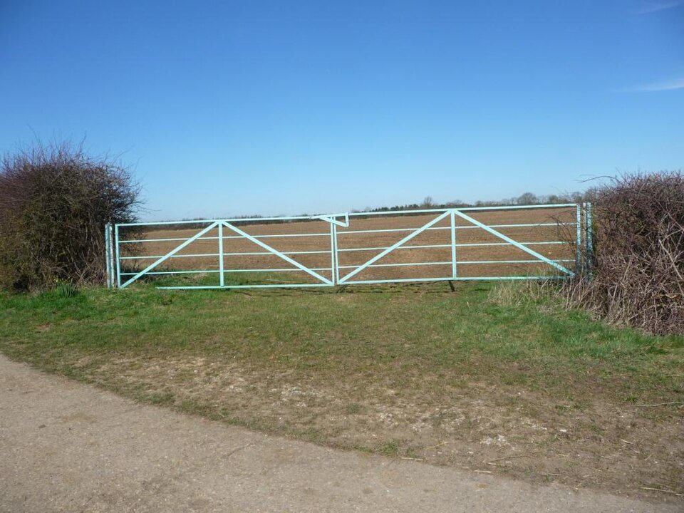 Pair of steel field gates across a field entrance