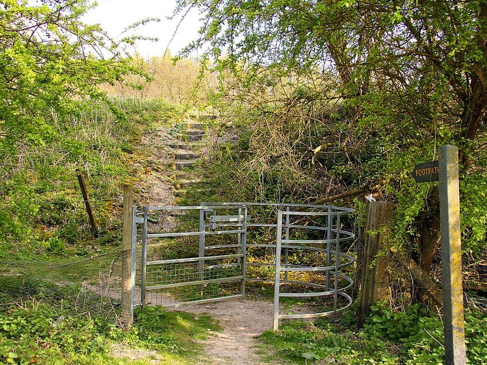 Galvanised steel kissing gate on a footpath